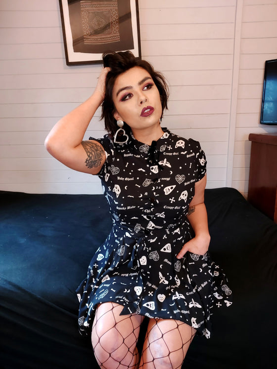 Collectif Mary Grace Skater Dress in Creepy Girl print